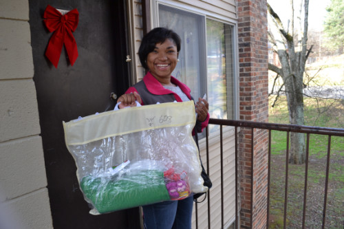 Mom receiving a Stocking of Love for her child